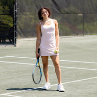 LA LUMI TENNIS DRESS - Petal (pink) Élevé